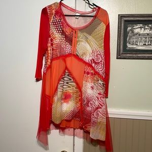 Long flowy shirt would look cute with leggings and boots